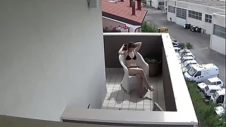 Spying my teen neighbour masturbating first of all her balcony